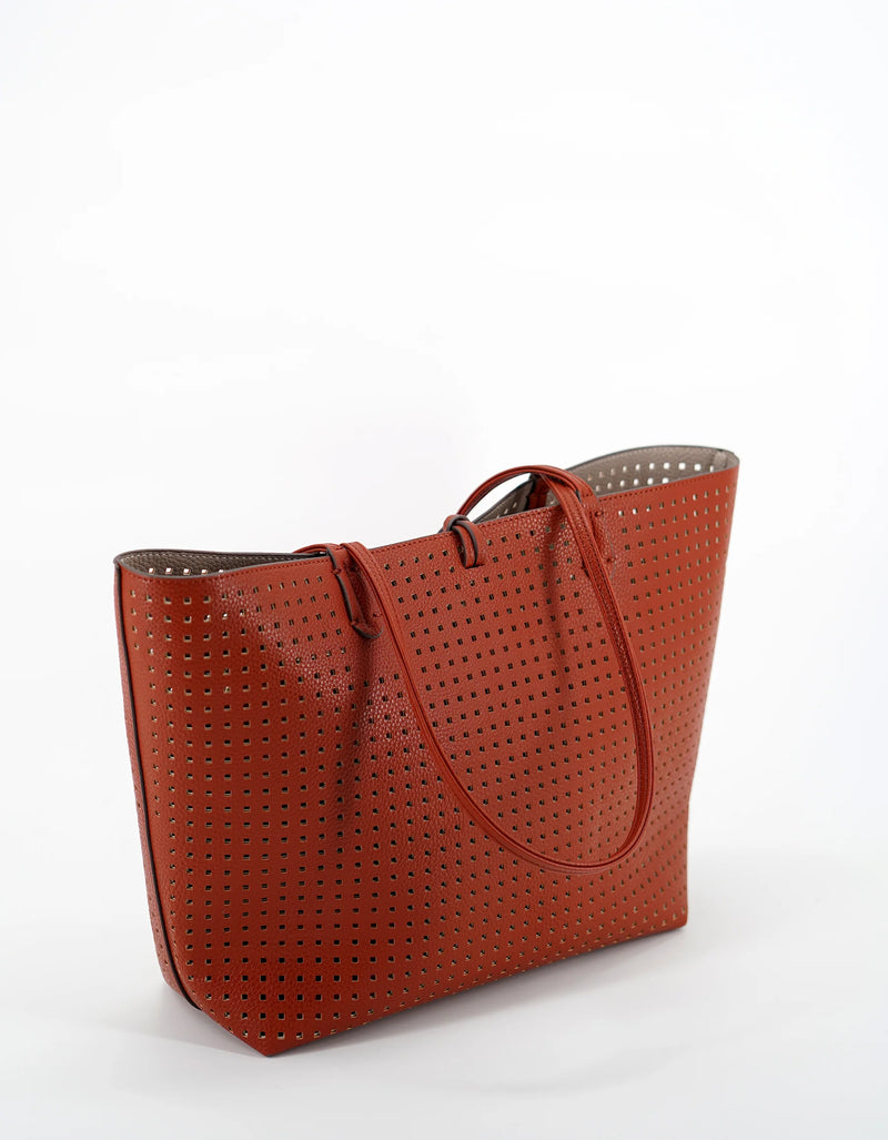 REMI/REID DEPARTURE PERFORATED SQUARE REVERSIBLE TOTE BAG - BURNT ORANGE/STONE