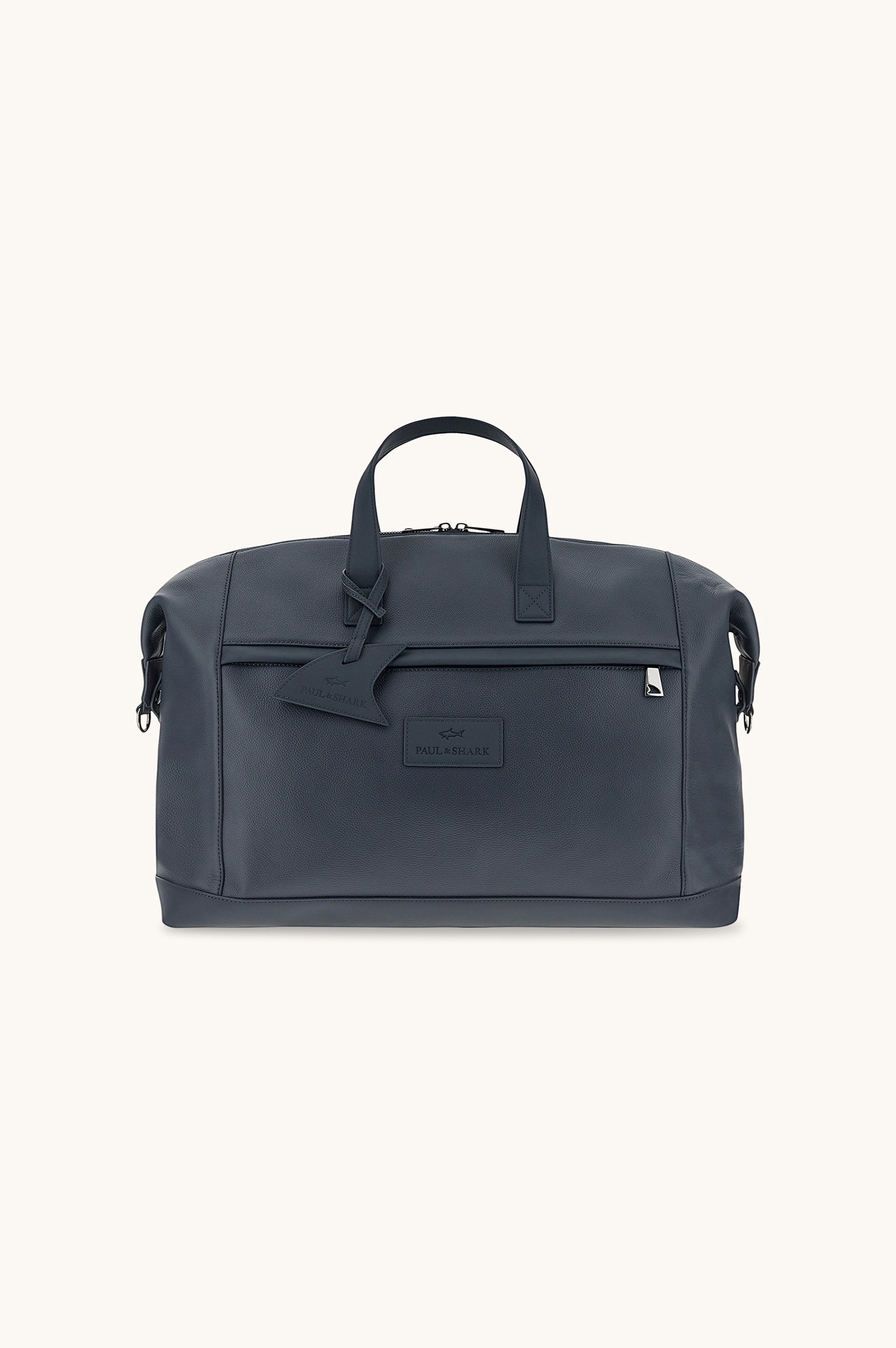 Button Down SF navy tumbled leather holdall bag with shark fin detailing, handles, and shoulder strap.