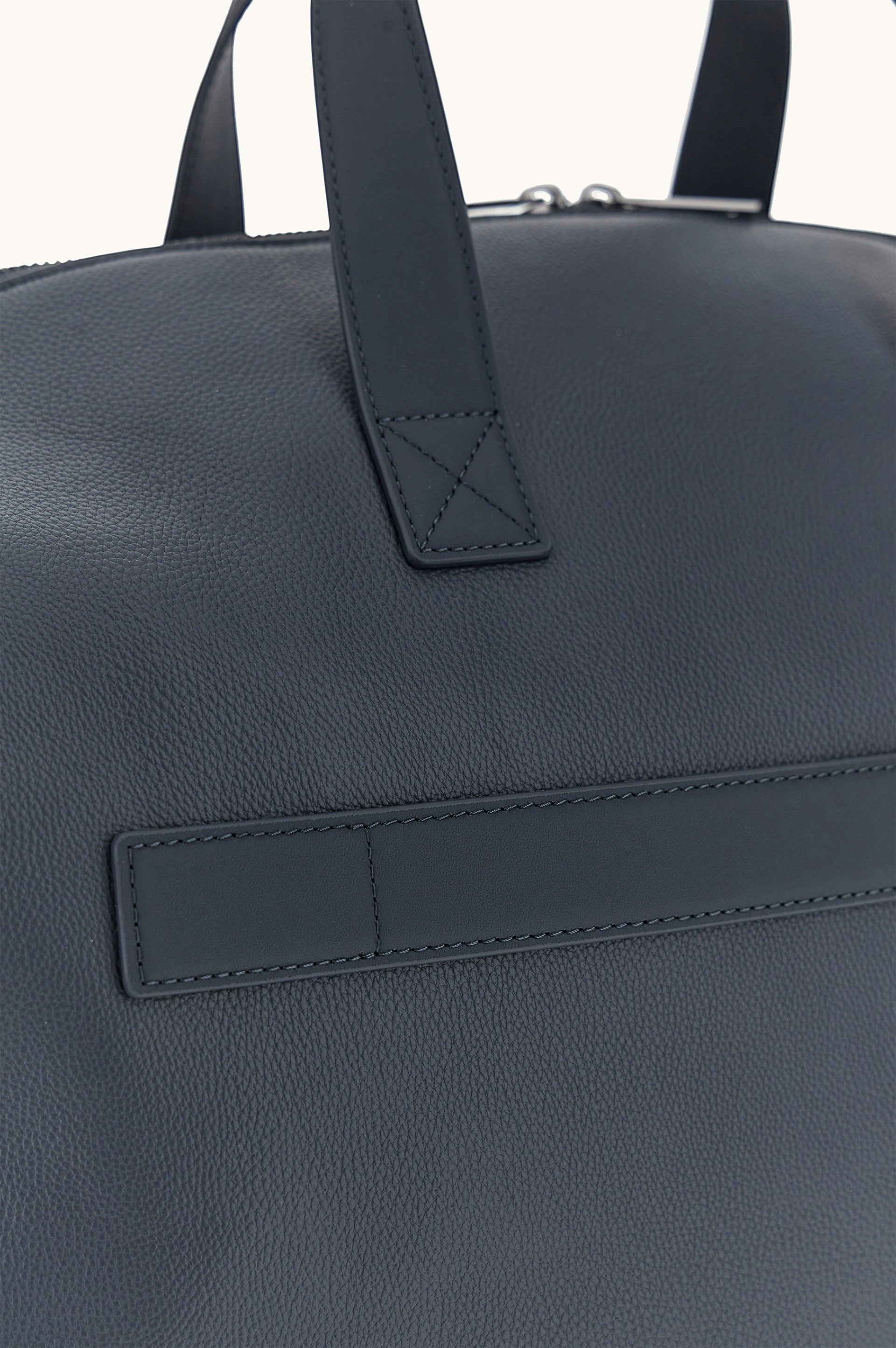 Button Down SF navy tumbled leather holdall bag with shark fin detailing and handles. Includes shoulder strap.