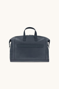 Button Down SF navy tumbled leather holdall bag with shark fin detailing and handles. Includes shoulder strap.