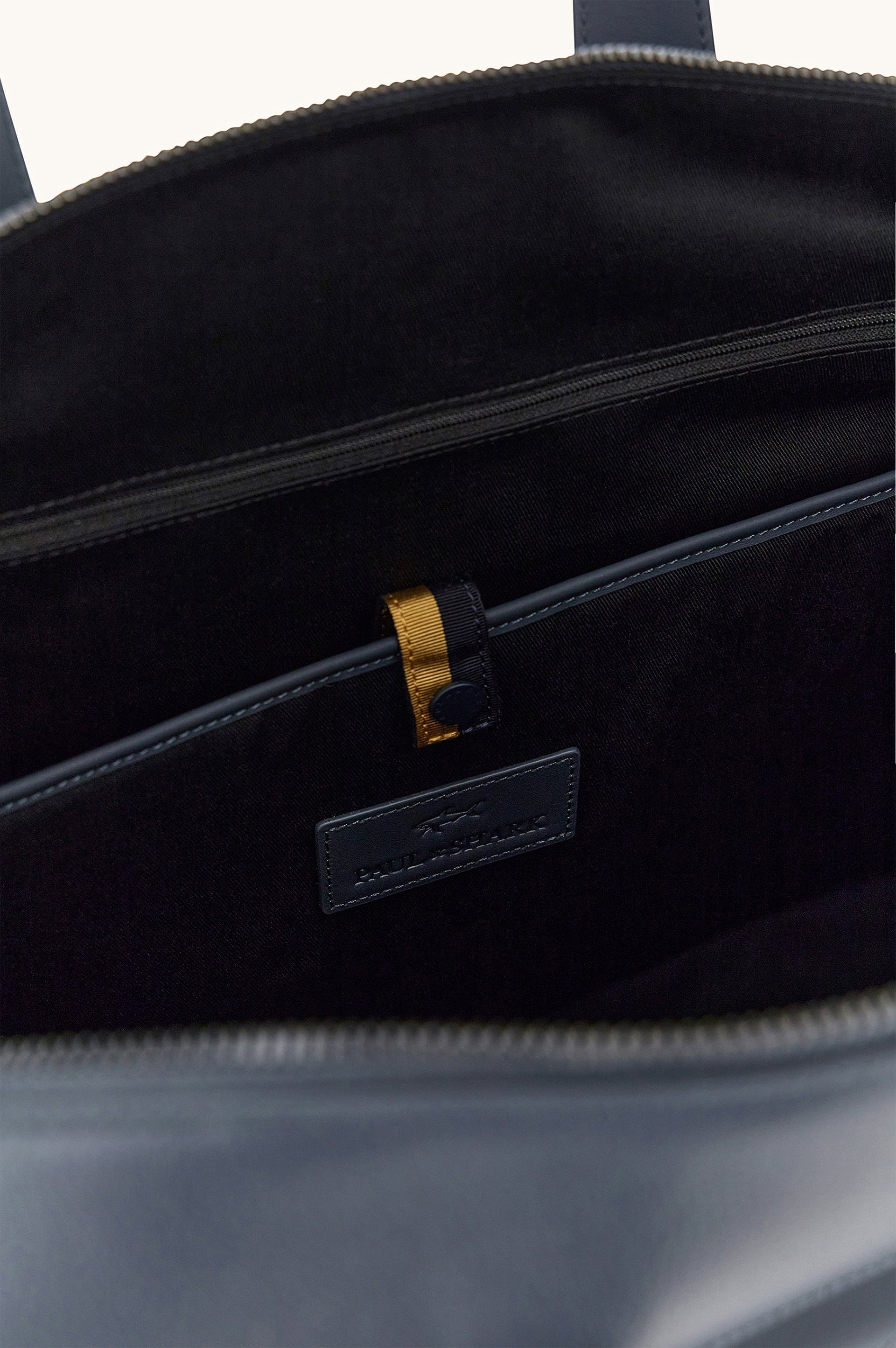 Button Down SF navy tumbled leather holdall bag with shark fin detail and shoulder strap. 100% real leather.