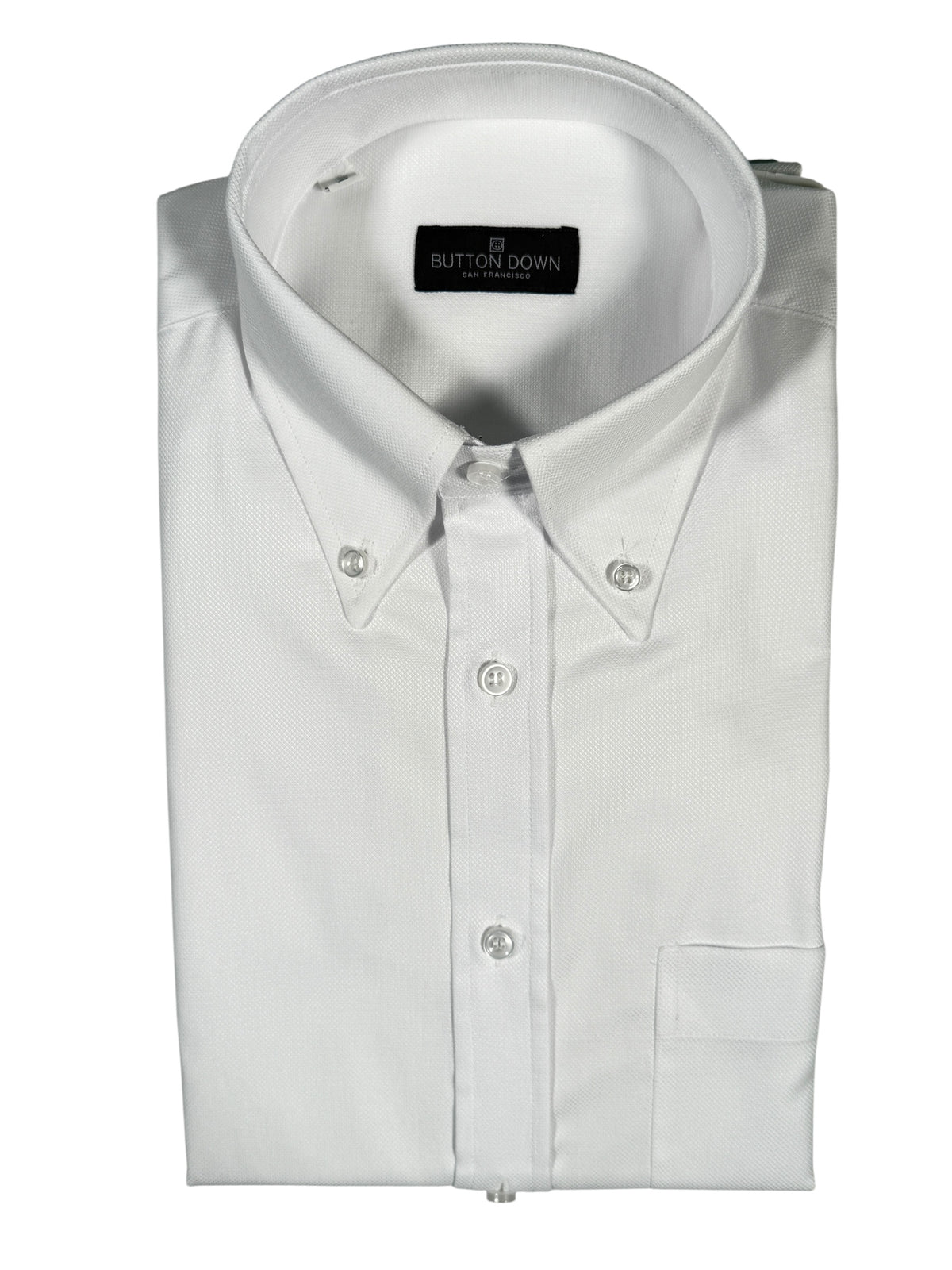 White dress shirt with collar and button details on a white background