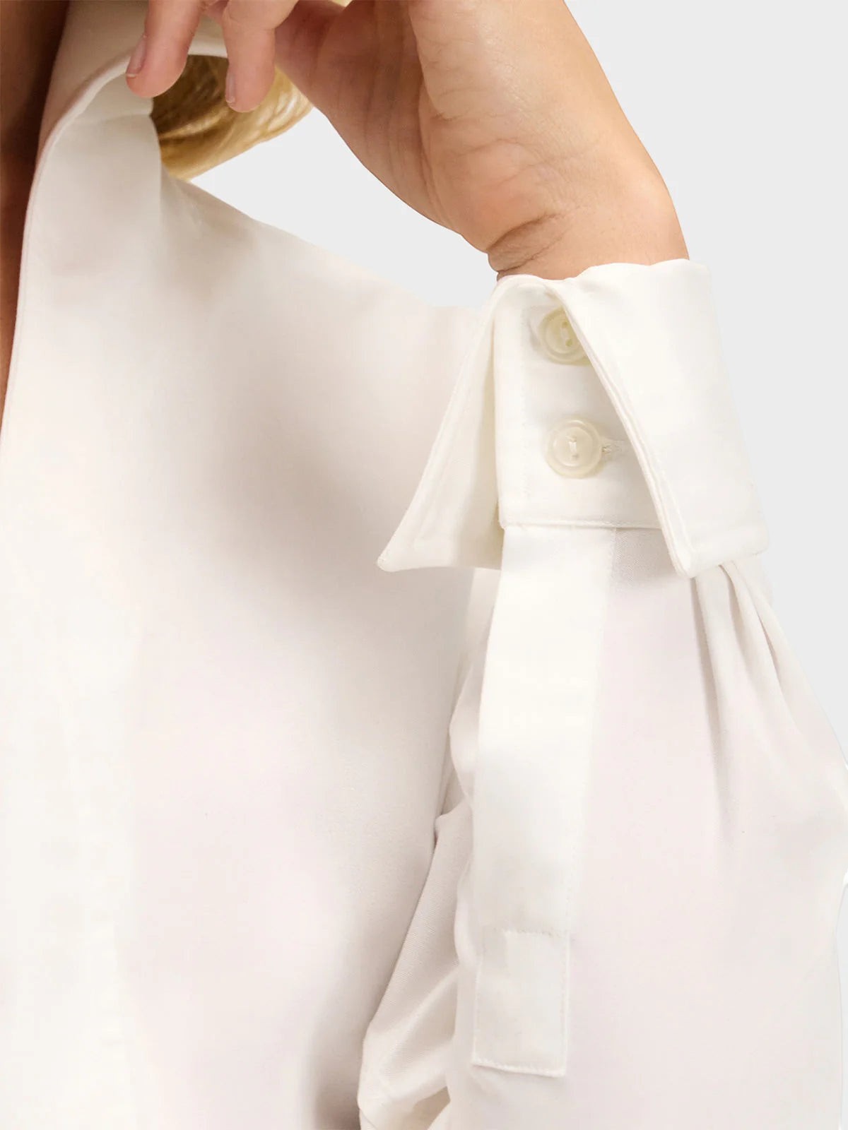 Button Down SF white lyocell shirt with French cuffs, concealed placket, and flared collar. Tailored fit.