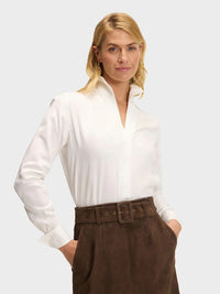 Button Down SF white lyocell shirt with flared collar, concealed placket, and French cuffs. Tailored fit.