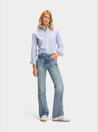 Button Down SF light blue cotton blend shirt with red swiss dots, flared collar, and concealed buttons.