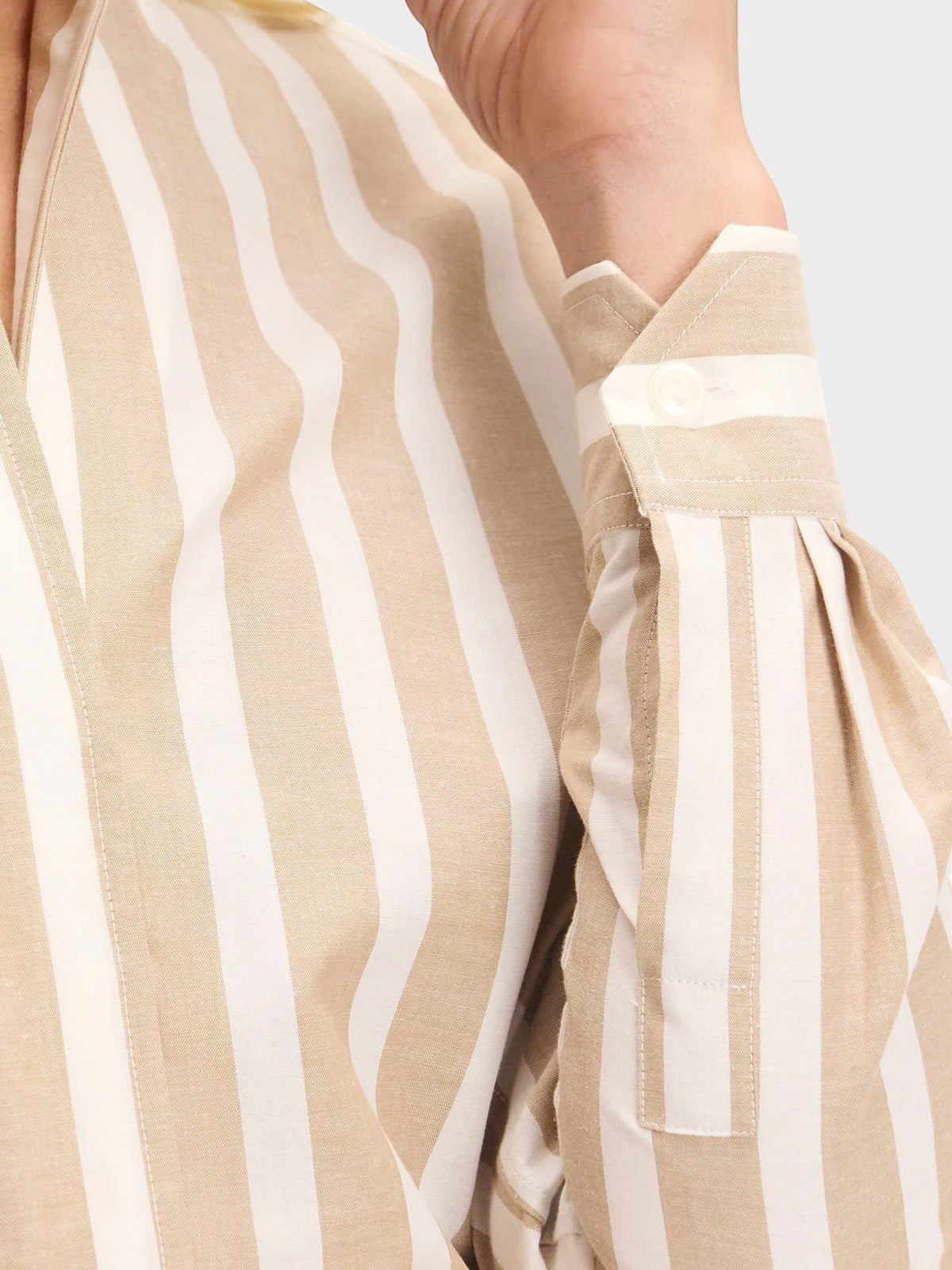 Button Down SF khaki and white striped organic cotton linen shirt with flared collar and chamfer cuffs.