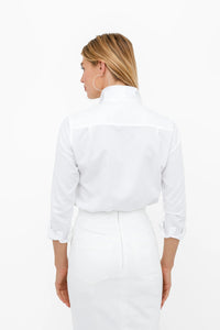 Button Down SF white cotton pique shirt with flared collar, concealed placket, and chamfer cuffs.