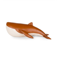 Button Down SF tan and wheat whale bookend made of vegan leather. A playful yet functional desk accessory.