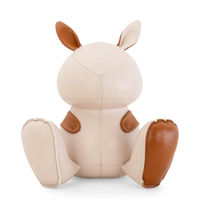 Button Down SF vegan leather rabbit bookend in wheat and tan. Cute home decor for shelves.