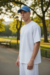 Button Down SF dark teal nylon baseball cap with shark fin logo detail. 100% polyester.