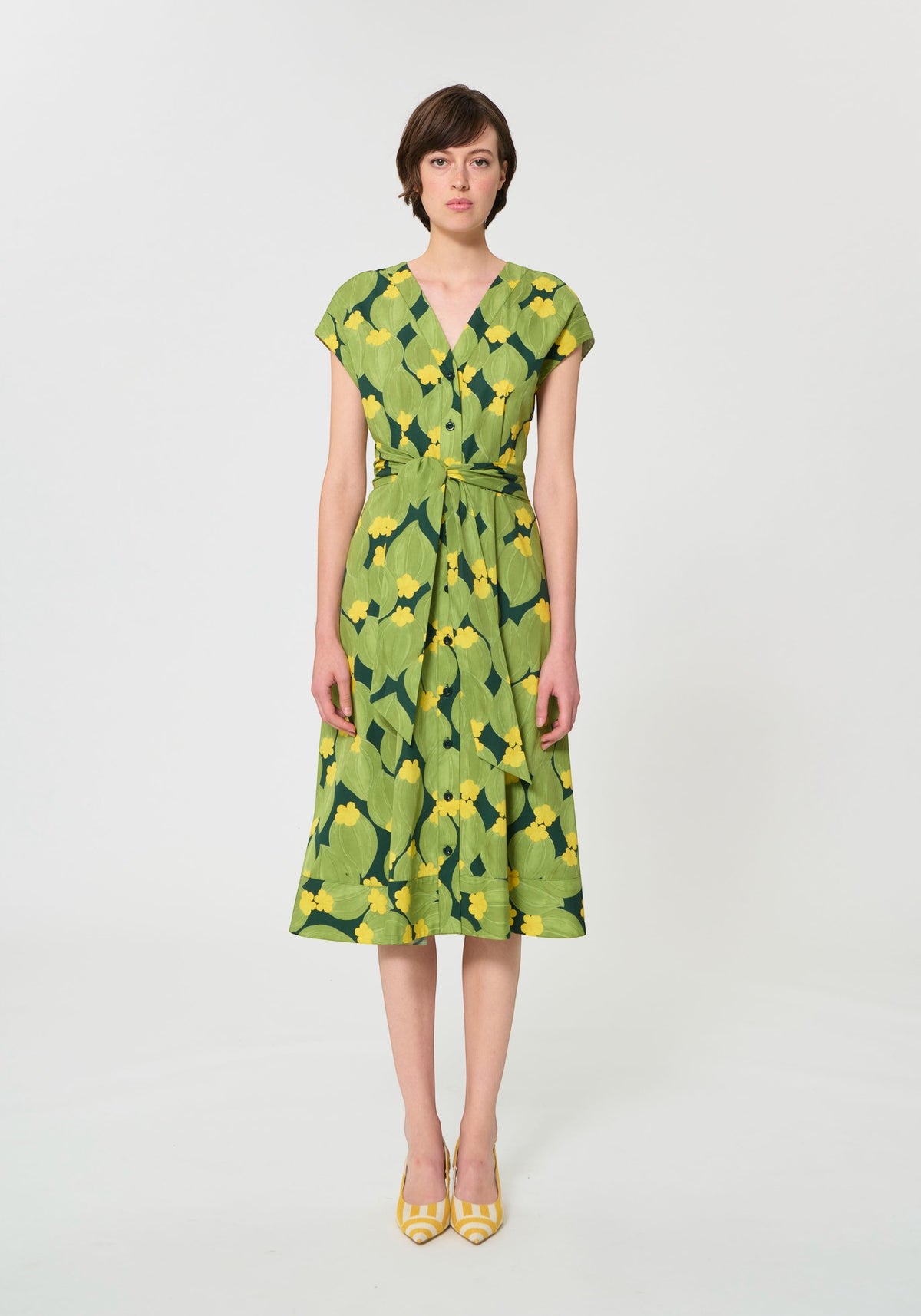 Button Down SF green and yellow botanical print cotton midi dress with V-neck, short sleeves, and tie waist.