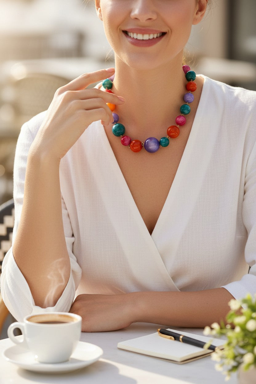 Button Down SF multicolor resin sphere necklace with adjustable length and gold-tone clasp. Made in Paris.