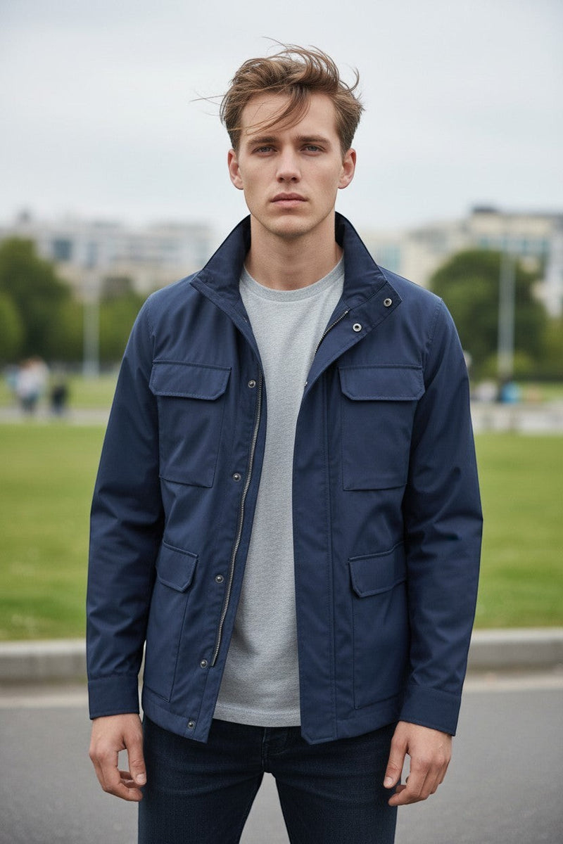Button Down SF navy blue Typhoon Platinum field jacket with zip and snap closure, stand-up collar, and four utility pockets.