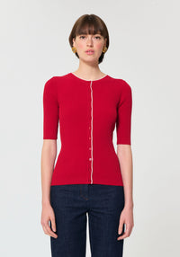 Button Down SF cerise red ribbed knit short-sleeve cardigan with white trim and button front.
