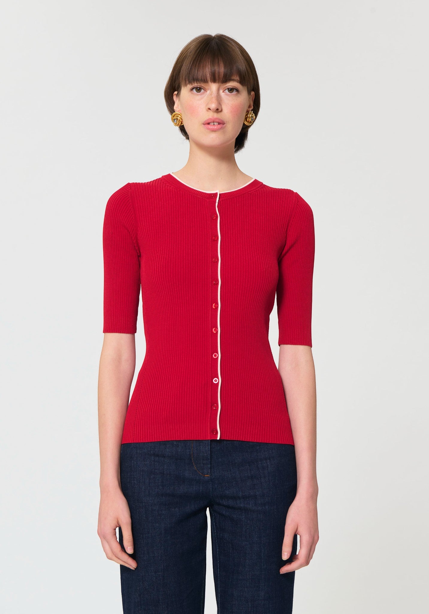 Button Down SF cerise red ribbed knit short-sleeve cardigan with white trim and button front.