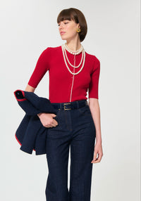 Button Down SF red ribbed knit short-sleeve cardigan with white trim and pearl buttons.