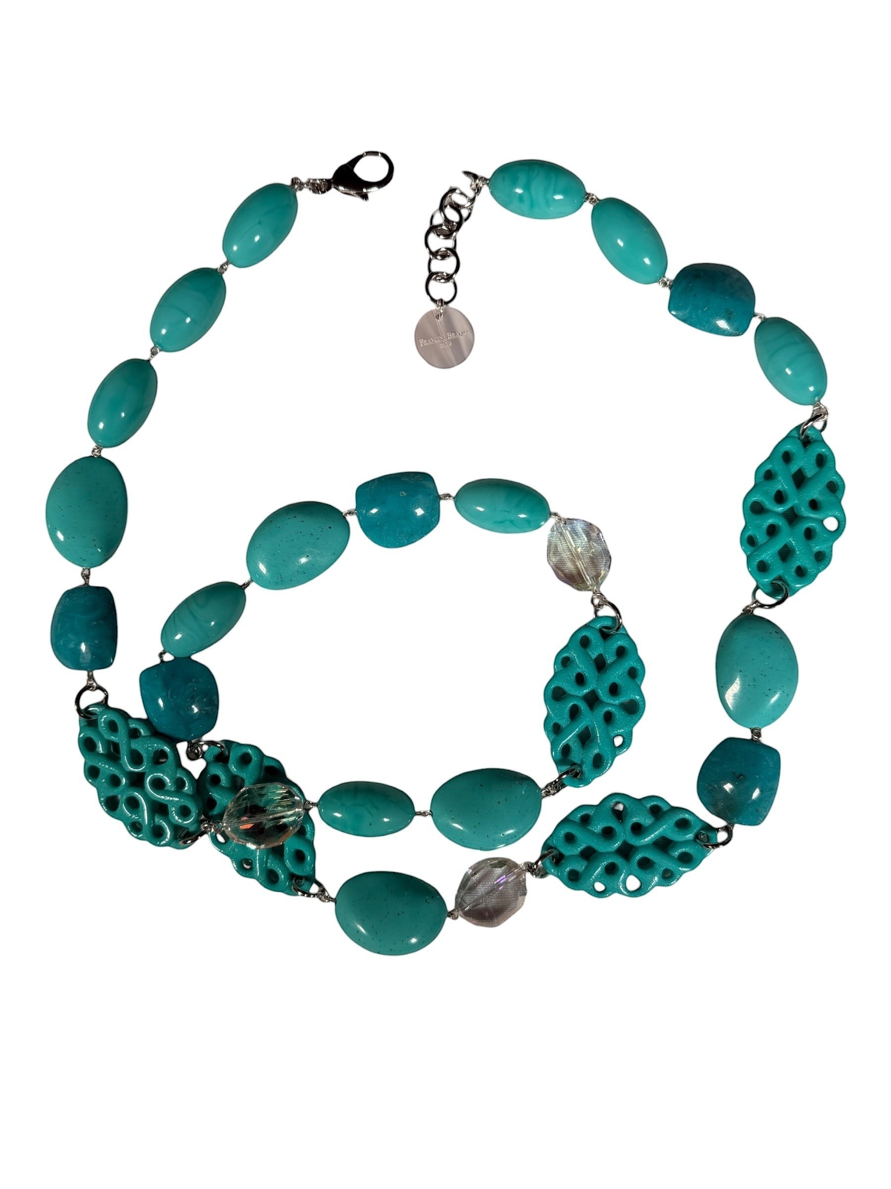 Button Down SF turquoise resin statement necklace with intricate carved details and polished beads. Made in Paris.