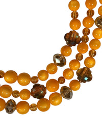 Button Down SF amber resin and crystal beaded layered necklace with gold-tone brass.