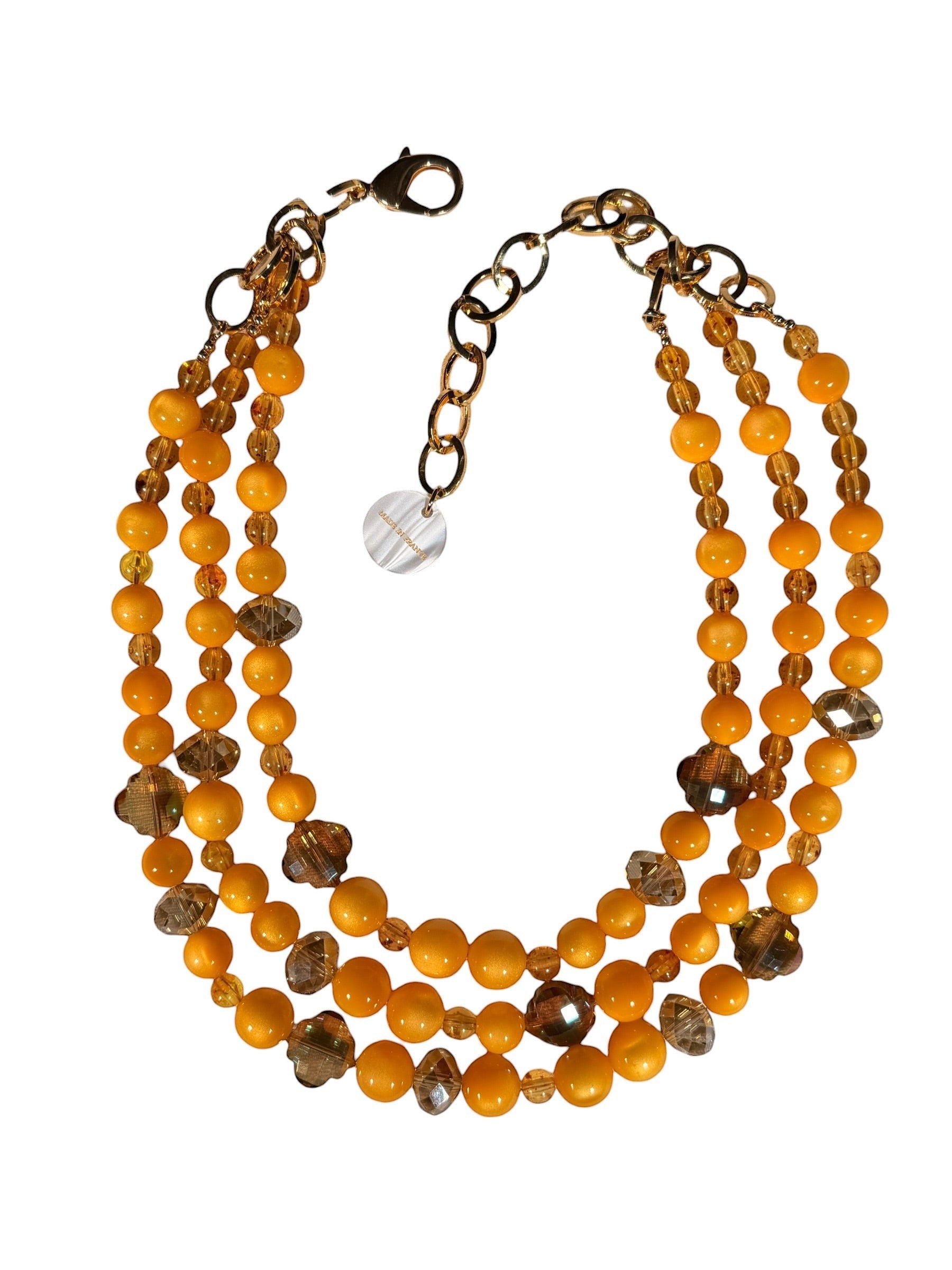 Button Down SF FRANCINE BRAMLI PARIS amber resin beaded layered necklace with crystal accents and gold chain.