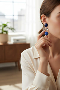 Button Down SF clip earrings with small blue spheres and clear crystal accents, made in Paris.