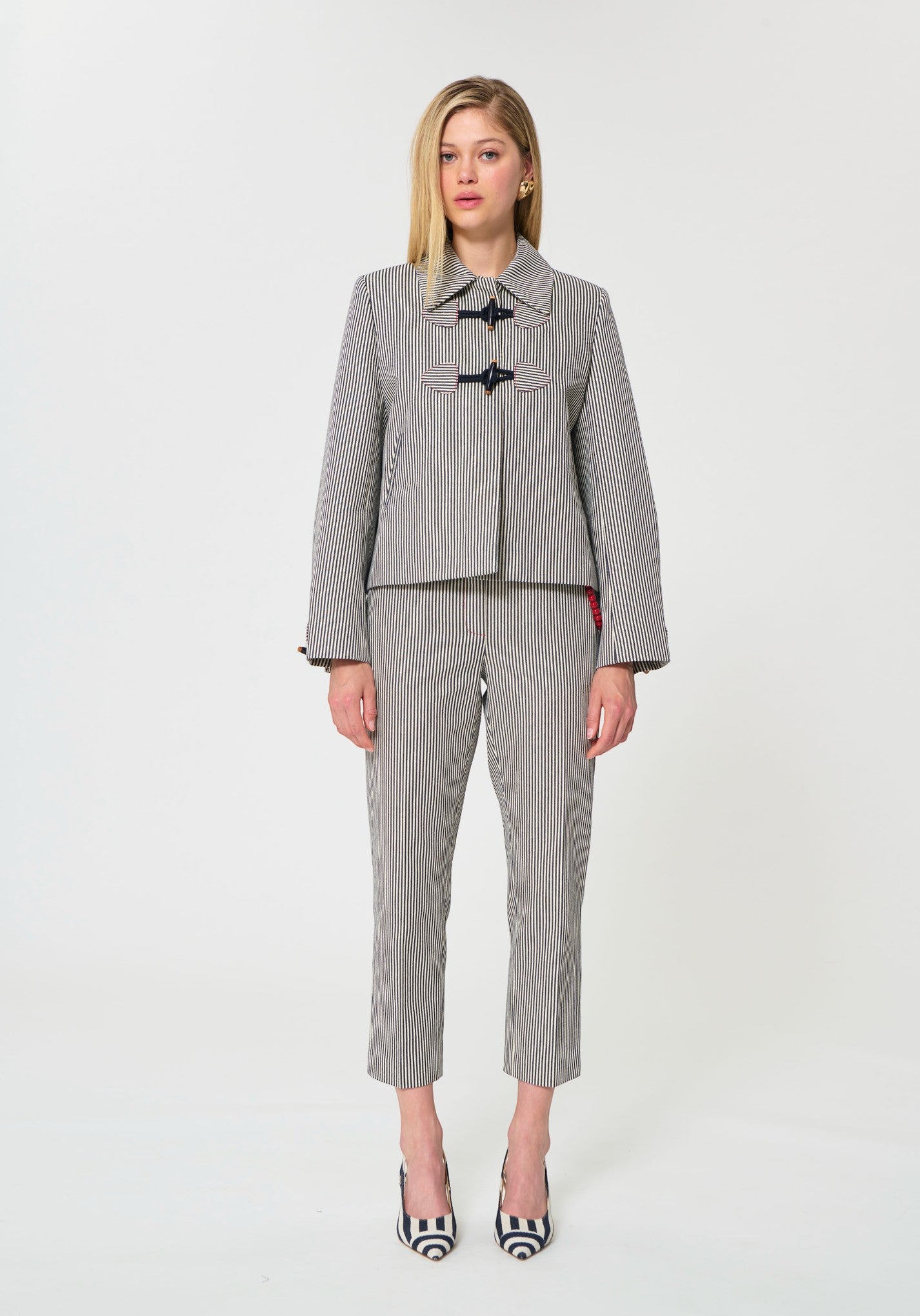 Button Down SF ecru stripe cotton duffle jacket and trousers set with toggle closure and classic collar.