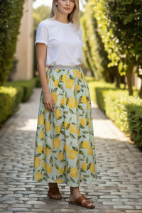 Button Down SF OUI Lemons midi skirt in green with yellow lemon print, A-line silhouette, elasticated waist with metallic thread detail.