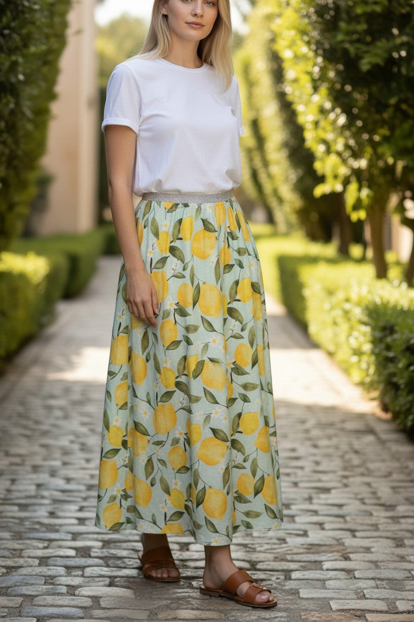 Button Down SF OUI Lemons midi skirt in green with yellow lemon print, A-line silhouette, elasticated waist with metallic thread detail.