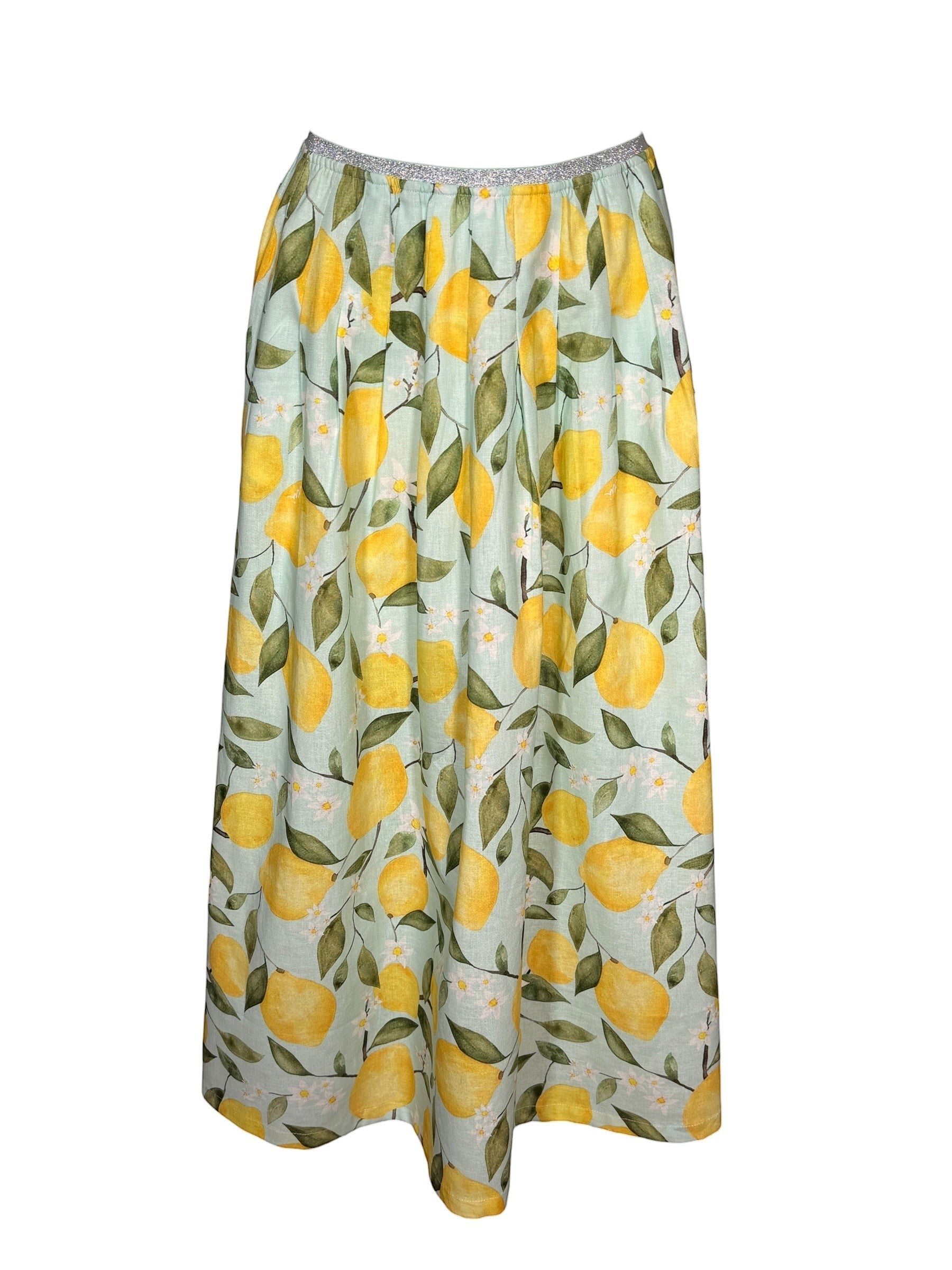 Button Down SF OUI Lemons midi skirt in green with yellow lemon print, elasticated waist with metallic thread detail. Linen-cotton blend.