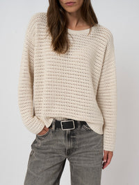 Button Down SF ivory open-stitch knit crew neck sweater made of cotton blend with a relaxed fit.