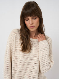 Button Down SF ivory open-stitch knit crew neck sweater made of cotton blend with a relaxed fit.