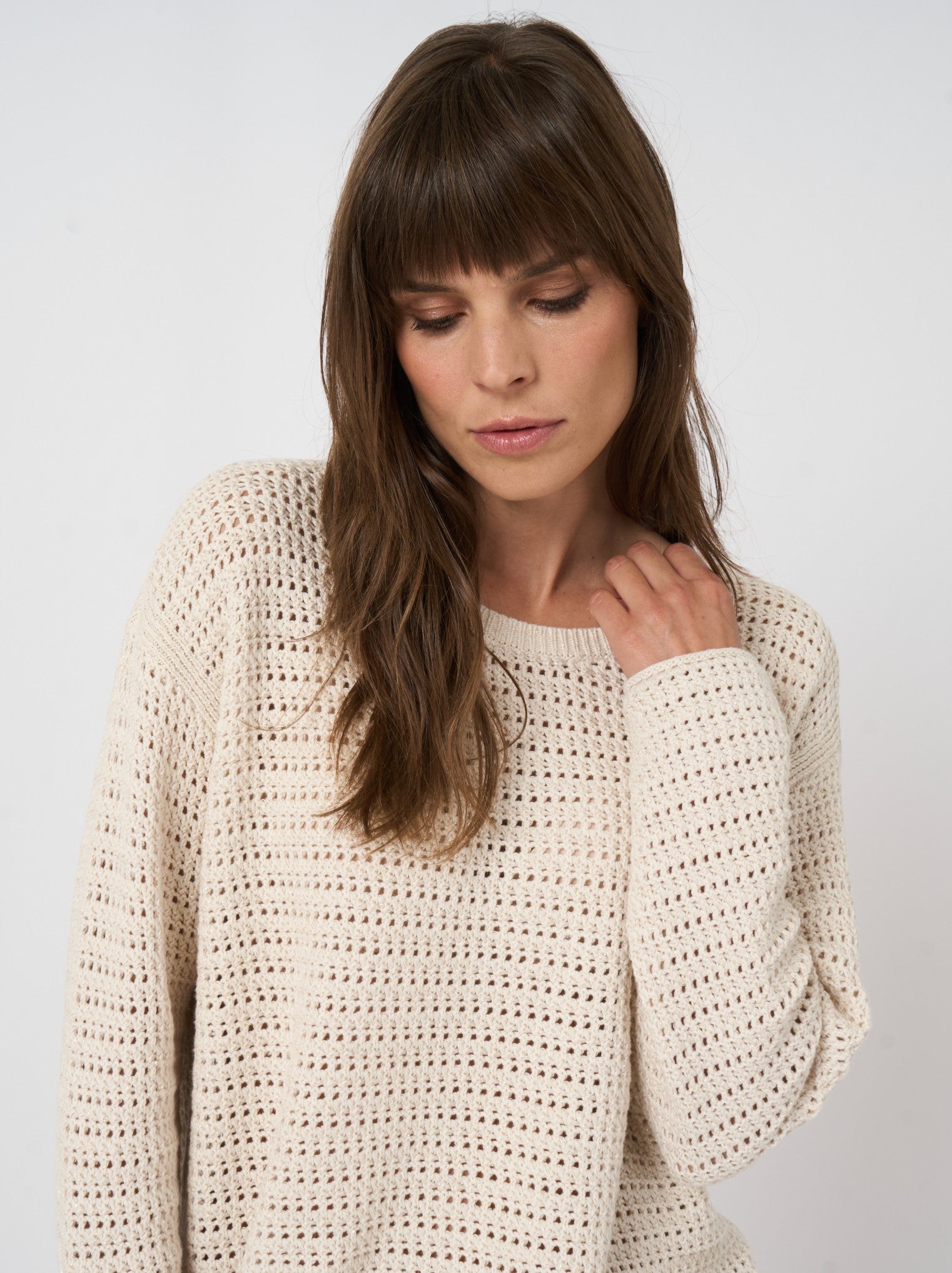 Button Down SF ivory open-stitch knit crew neck sweater made of cotton blend with a relaxed fit.