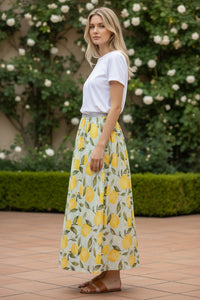 Button Down SF green and yellow lemon print midi skirt with elasticated waist and metallic thread detail, A-line silhouette, linen-cotton blend.