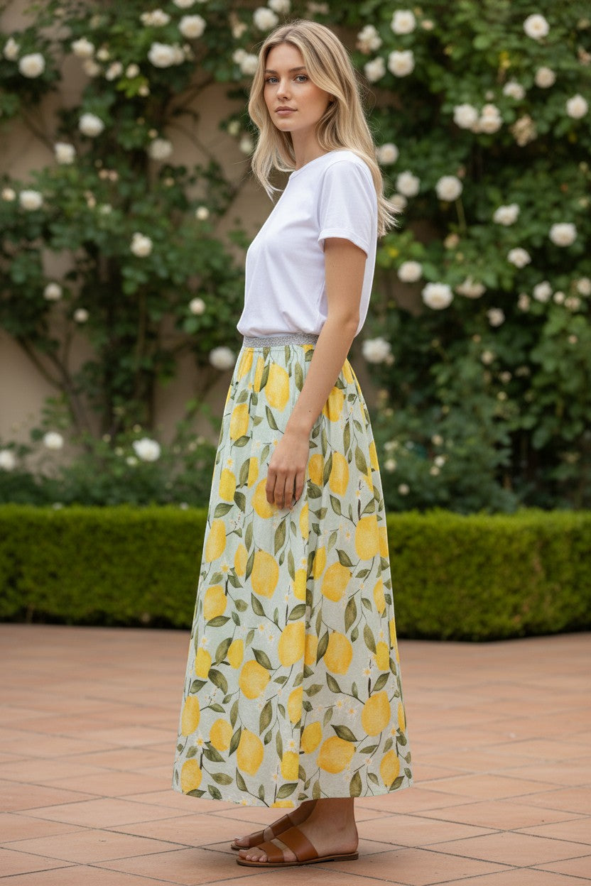 Button Down SF green and yellow lemon print midi skirt with elasticated waist and metallic thread detail, A-line silhouette, linen-cotton blend.