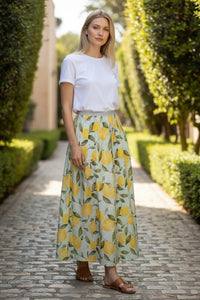 Button Down SF OUI Lemons Skirt: midi A-line skirt with all-over lemon print on light green background, elasticated waist with metallic thread detail. Linen-cotton blend.
