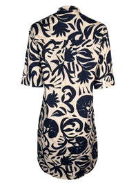 Button Down SF navy and white abstract floral print 100% cotton dress with stand collar and elbow-length sleeves.