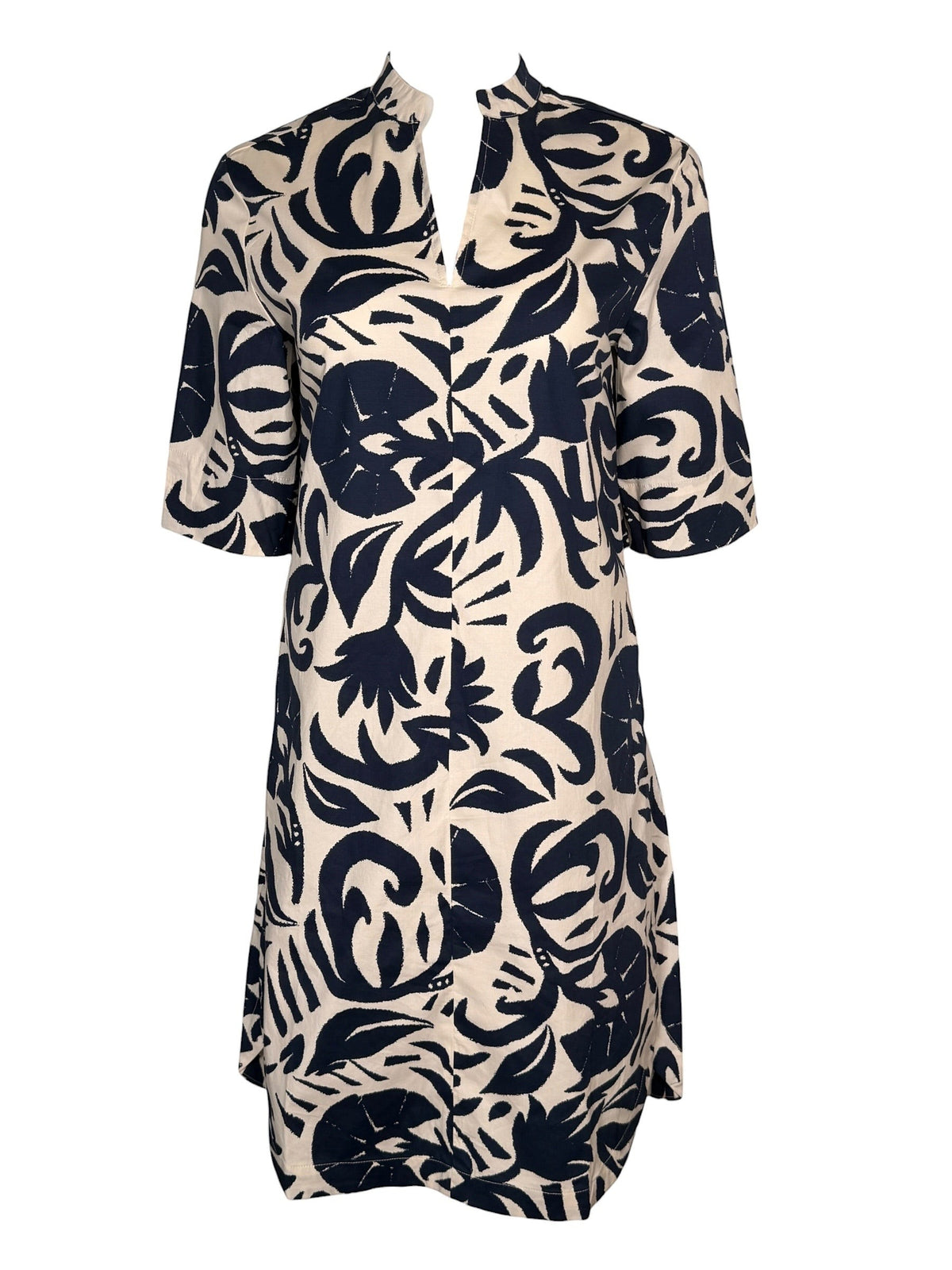 Button Down SF navy and white abstract floral print 100% cotton dress with stand collar and V-neckline.