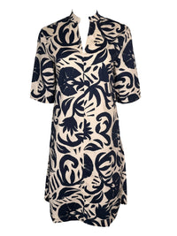 Button Down SF navy and white abstract floral print 100% cotton dress with stand collar and V-neckline.