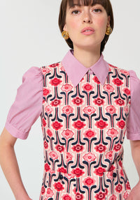 Button Down SF pink, red, navy floral print cotton mini dress with puff sleeves and collar.