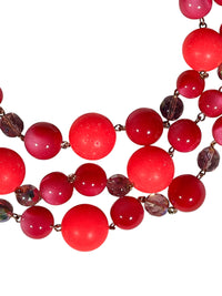 Button Down SF FRANCINE BRAMLI PARIS chunky red and coral beaded statement necklace with crystal accents.