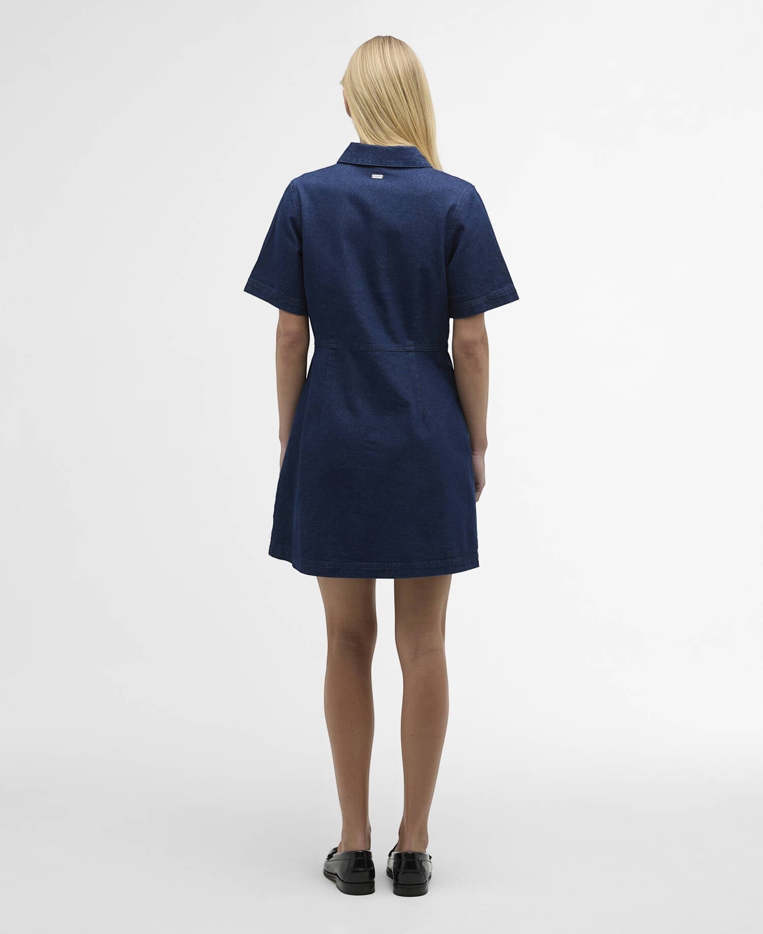 Button Down SF rinse wash blue denim mini shirt dress with short sleeves and side pockets, worn by a blonde model.