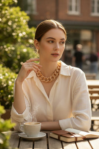 Button Down SF Francine Bramli Paris tan resin link necklace with gold chain and adjustable length. Made in France.