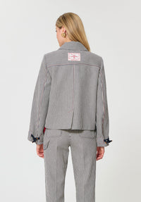 Button Down SF TARA JARMON ecru stripe cotton duffle jacket and trousers set with toggle closure and classic collar.