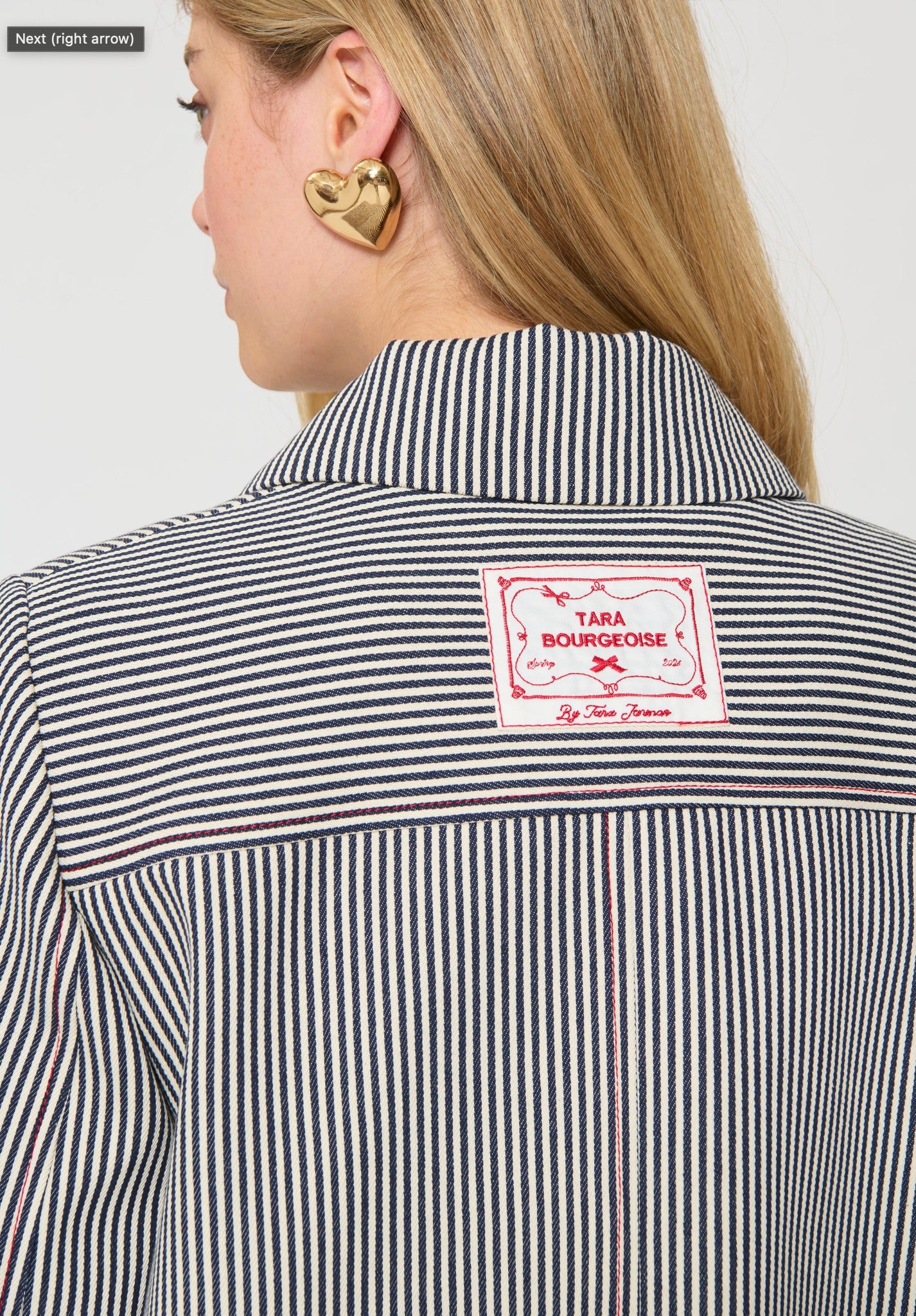 Button Down SF TARA JARMON ecru stripe cotton duffle jacket with toggle closure and classic collar.