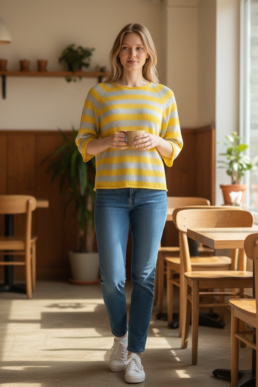 Button Down SF yellow and grey striped linen blend sweater with round neck and 3/4 sleeves, worn by a woman holding a mug.