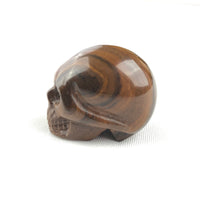 BUTTON DOWN CARVED STONE SMALL SKULL - RED TIGER EYE